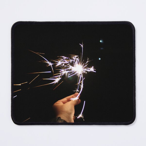Item preview, Burning sparkler in hand on a black background designed and sold by yulchikon.