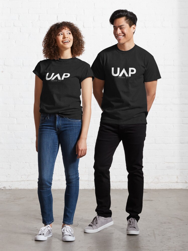Thumbnail 1 of 7, Classic T-Shirt, UAP Media UK Logo (White) designed and sold by Dan Zetterström.