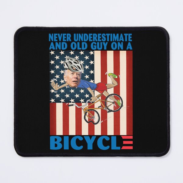 Item preview, Never Underestimate An Old Guy on a Bicycle Funny Biden Falling off designed and sold by adolfonewell04.