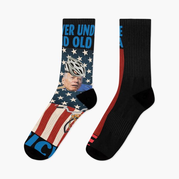 Item preview, Never Underestimate An Old Guy on a Bicycle Funny Biden Falling off designed and sold by adolfonewell04.
