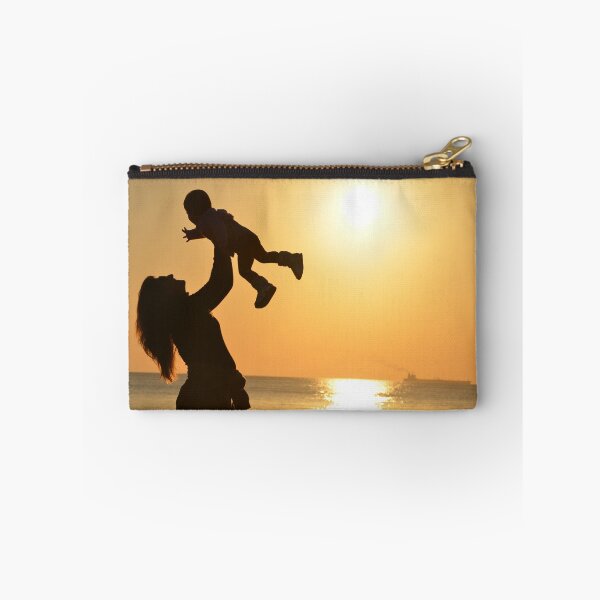 Item preview, mother and child silhouetted against sun and sea designed and sold by ydsdesigns.