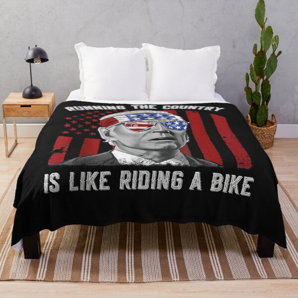 Item preview, Funny Merry 4th Of July Joe Biden falling off his bicycle designed and sold by Lynette1241.