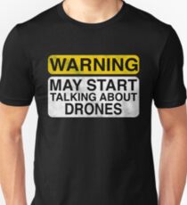 Camiseta unisex Advertencia puede comenzar a hablar sobre aviones no tripulados