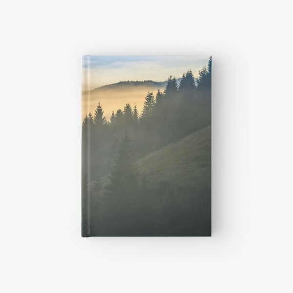 pine forest in fog at sunrise Hardcover Journal