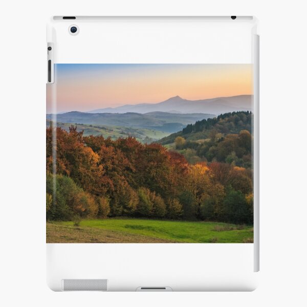sunset over autumn forest in hazy mountains iPad Snap Case