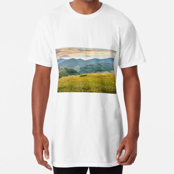 grassy meadow in mountains at sunrise Long T-Shirt