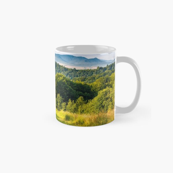 stacks of hay on the hill side Classic Mug