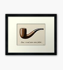 The Treachery of Images - Magritte Framed Print