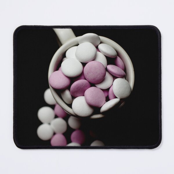 Item preview, Pink and white peppermint candies in a cup on a black background designed and sold by Michaelerch.
