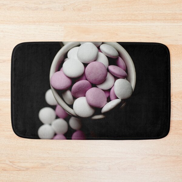 Item preview, Pink and white peppermint candies in a cup on a black background designed and sold by Michaelerch.