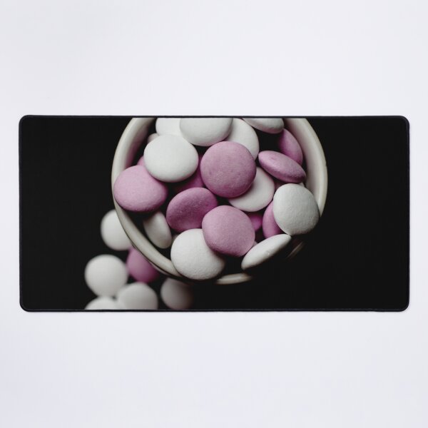 Item preview, Pink and white peppermint candies in a cup on a black background designed and sold by Michaelerch.