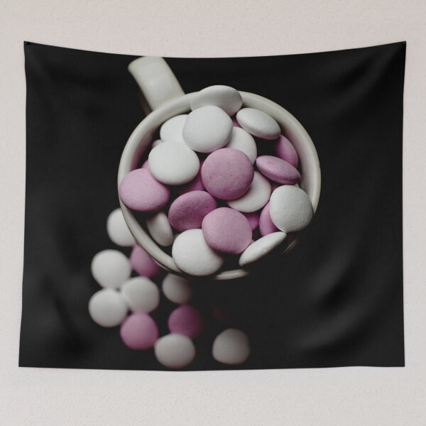 Item preview, Pink and white peppermint candies in a cup on a black background designed and sold by Michaelerch.