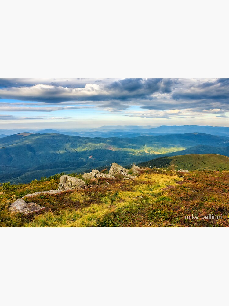 huge stones on the meadow on top of mountain ridge by mike-pellinni