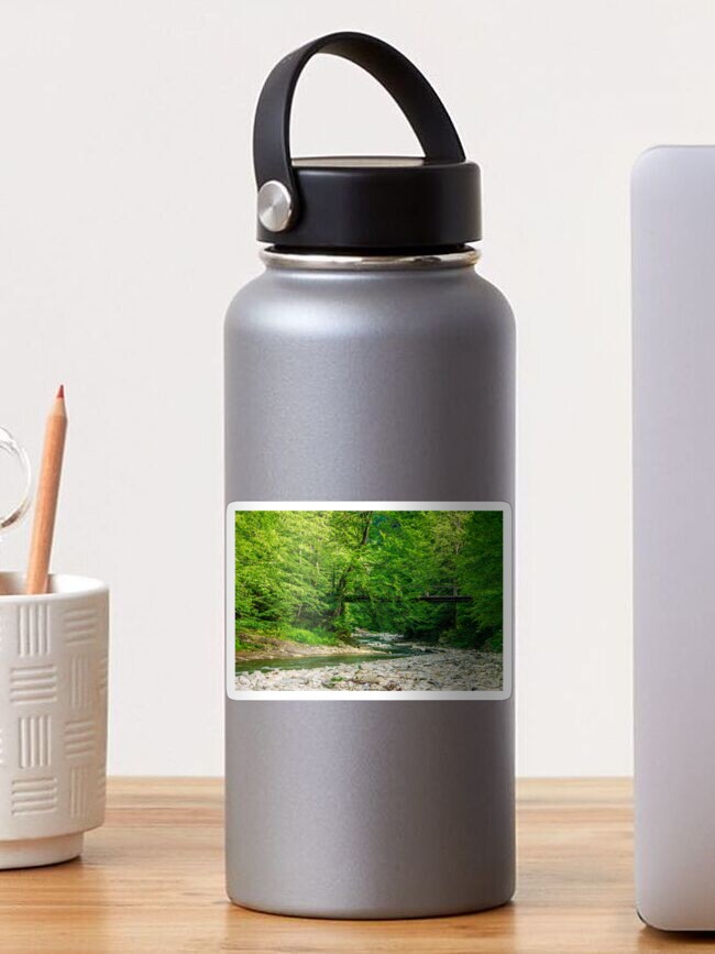 Thumbnail 1 of 3, Sticker, bridge over the forest river designed and sold by mike-pellinni.