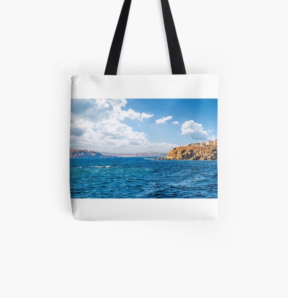 town on a cliff above the seashore All Over Print Tote Bag