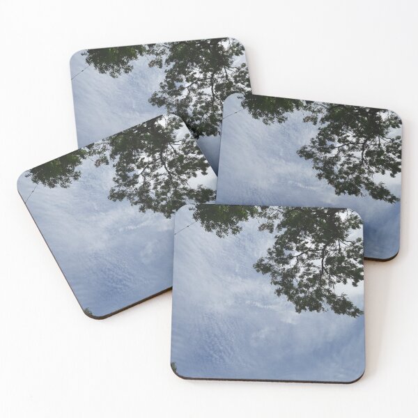 Item preview, A picturesque beautiful blue sky with clouds and branches of neem tree and its leaves designed and sold by Arteartz.