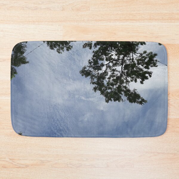 Item preview, A picturesque beautiful blue sky with clouds and branches of neem tree and its leaves designed and sold by Arteartz.