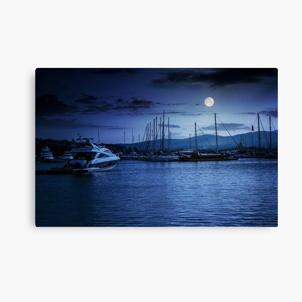yacht at the pier at night Canvas Print