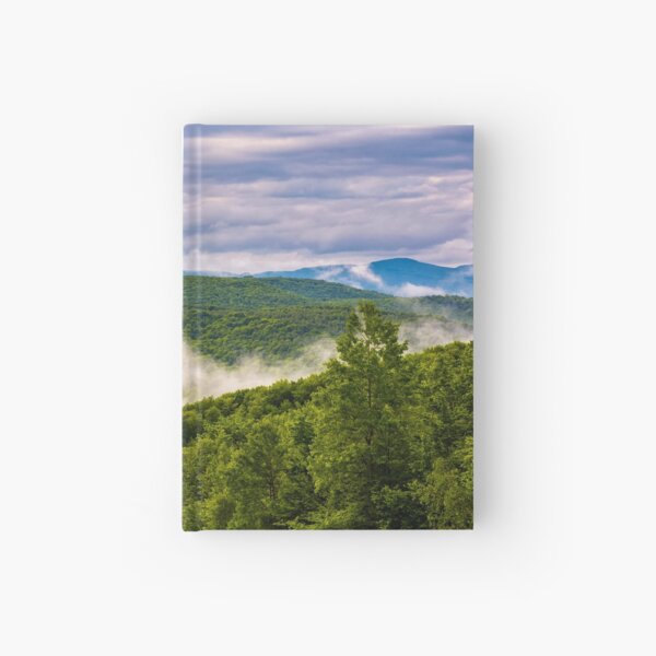 foggy mountain ridge over the forest in springtime Hardcover Journal