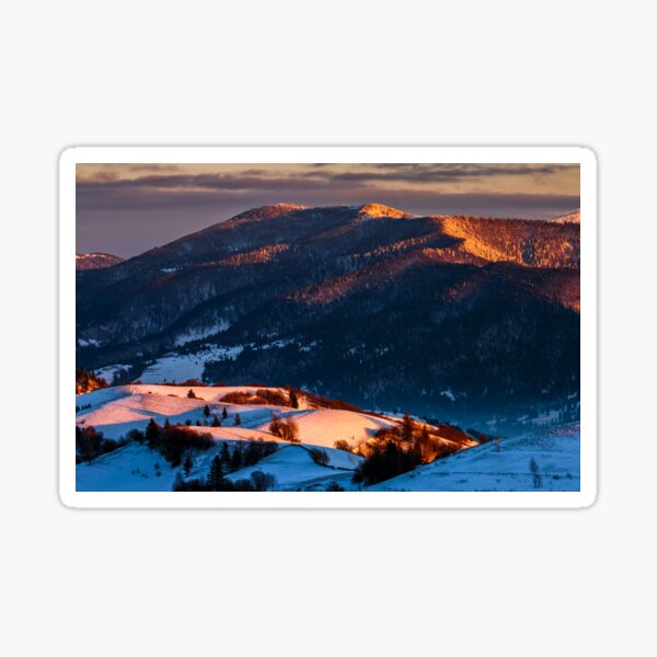 winter sunrise in mountainous rural area Sticker