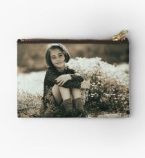 Cute girl with flowers field Studio Pouch