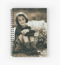 Cute girl with flowers field Spiral Notebook