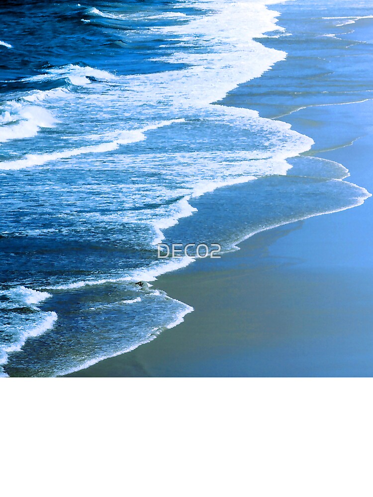 Sapphire-Blue-Hues Ocean Waves With Bubbly Surf