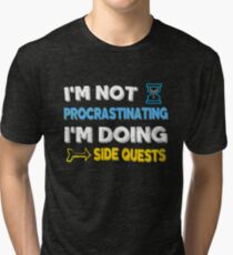 I'm not procrastinating... I'm doing side quests Tri-blend T-Shirt