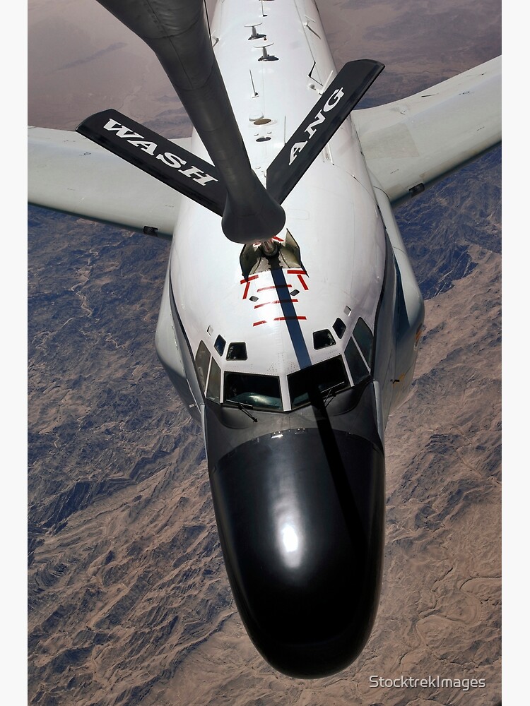 "An RC135 Rivet Joint Reconnaissance aircraft receives fuel from a KC