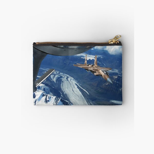 Item preview, A U.S. Air Force F-15C Eagle positioning itself behind a KC-135R Stratotanker over Alaska. designed and sold by StocktrekImages.