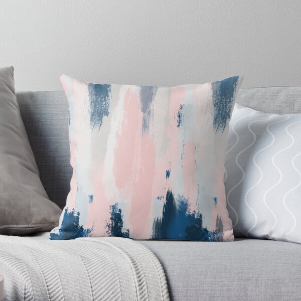 Blush pink shop and navy cushions