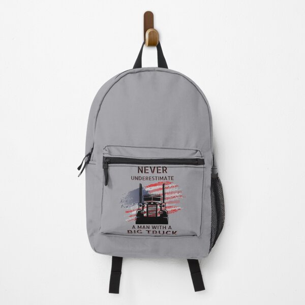Item preview, Never Underestimate A Man With A Big Truck USA American Flag OTR Merica Semi Over the Road Trucker Trucking Long Haul Long Distance Travel Rig designed and sold by CarantinedChaos.