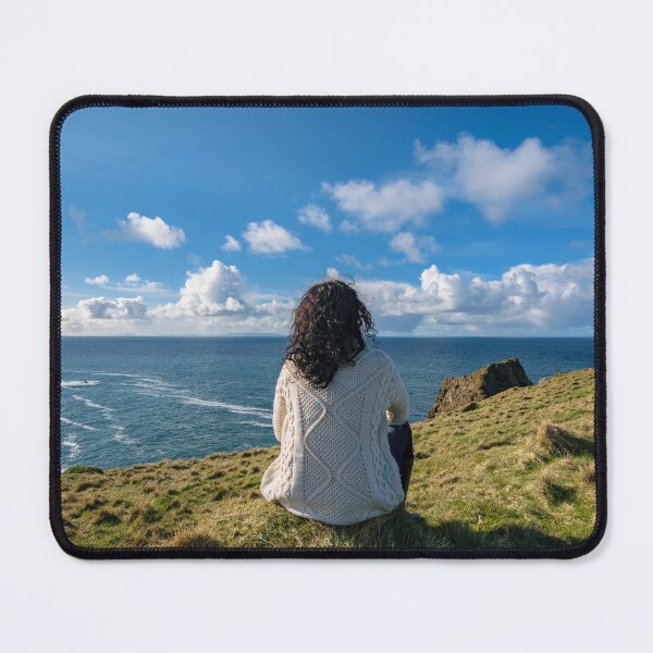 Item preview, The woman sits and enjoys ocean view from the Silver Strand in Malin Beg, near Glencolmcille, South West Donegal, Ireland designed and sold by AlbertMi.