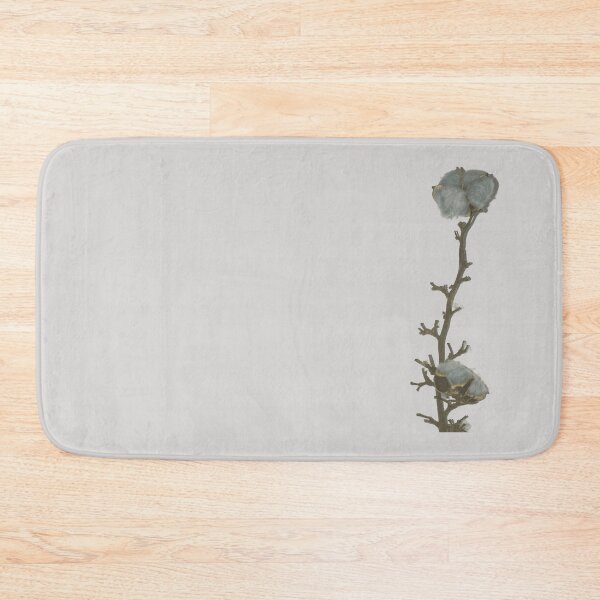 Item preview, Single twig of natural grey blue cotton boll leaning against the white illuminated wall background designed and sold by Khala.