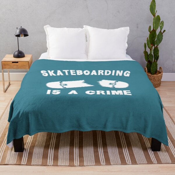 Item preview, Skateboarding Is A Crime Not A Sport Saying designed and sold by ZinMio.