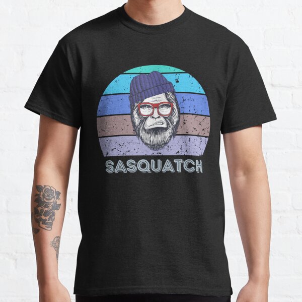 Men's Fishing Bigfoot T-Shirt | Fisherman Funny Outdoor Pole Rod Fish Sasquatch Tshirt | Unique Birthday Gift Idea Shirt M / Black