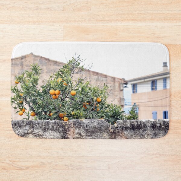 Item preview, Orange Tree Behind the Stonewall Mallorca Spain designed and sold by PhotosByVille.