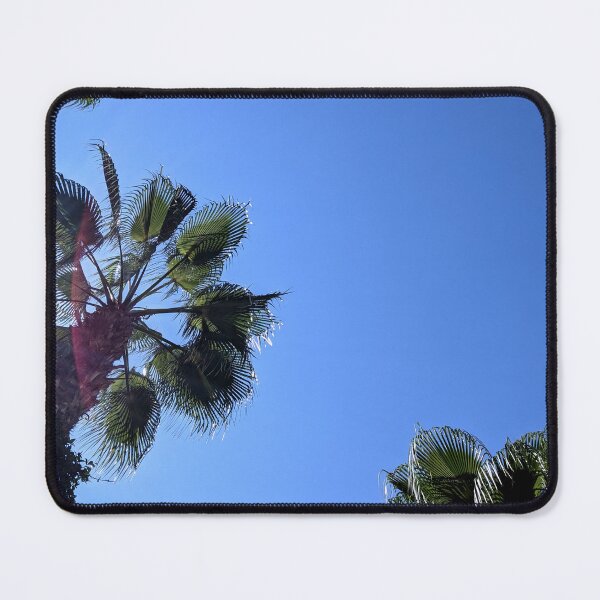 Item preview, Palm trees against a clear blue sky. designed and sold by HelgaScand.