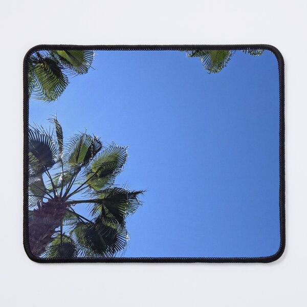 Item preview, Palm trees against a clear blue sky. designed and sold by HelgaScand.