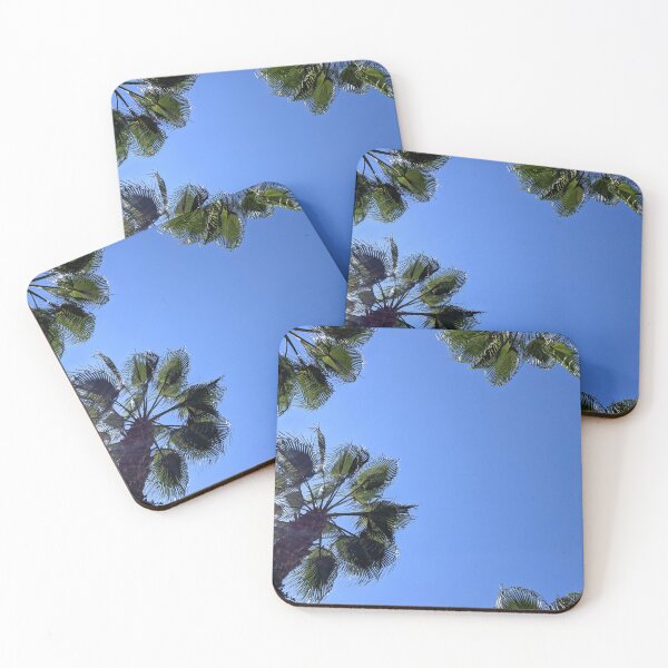 Item preview, Palm trees against a clear blue sky. designed and sold by HelgaScand.