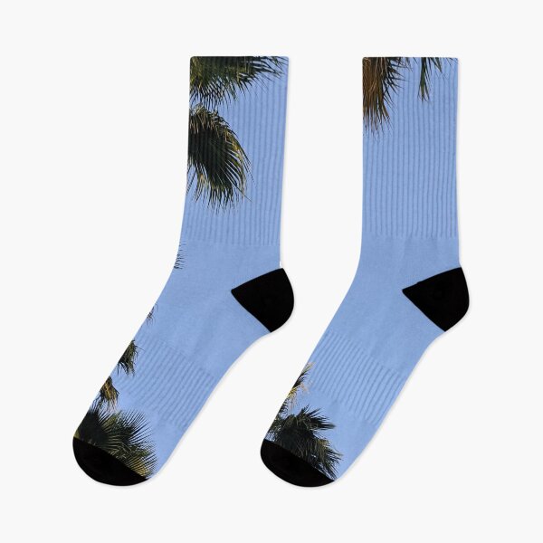 Item preview, Palm trees against a clear sky at sunset. designed and sold by HelgaScand.