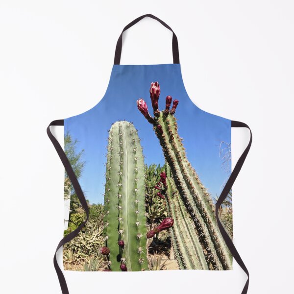 Item preview, Cactus blooms in a cactus garden against a clear blue sky designed and sold by HelgaScand.