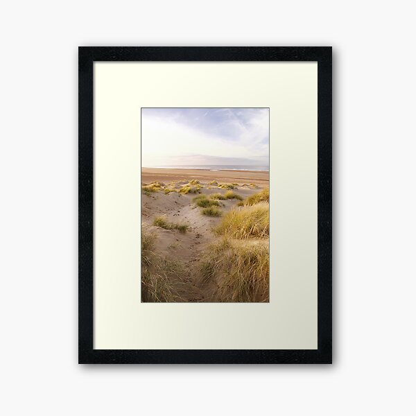 Holkham golden view through the dunes framed print. Framed Art Print