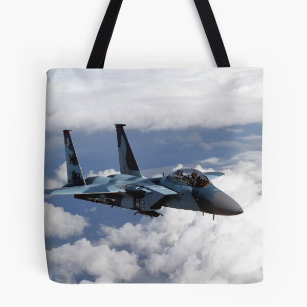 Item preview, An F-15C Aggressor flies over a mountain range. designed and sold by StocktrekImages.
