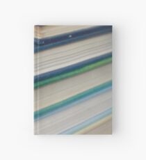 Pile of books - blue Hardcover Journal