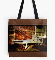 An Old Wheelbarrow, An Ancient House Tote Bag