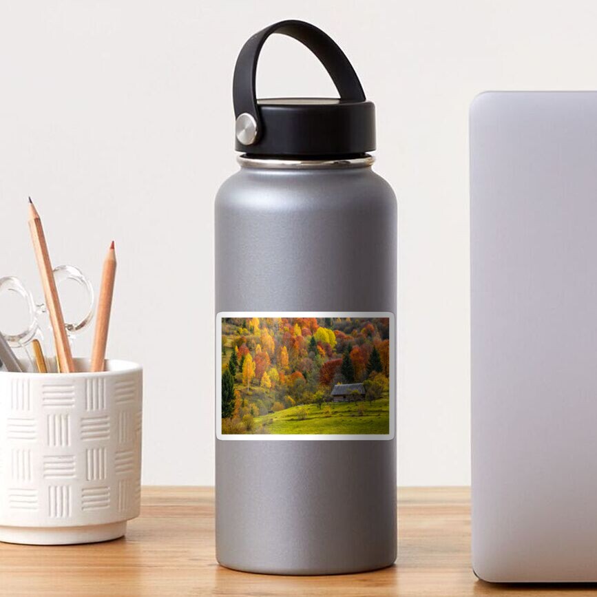 woodshed on the hillside in autumn mountains Sticker