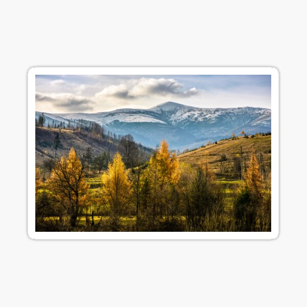 snowy peaks over autumn forest Sticker