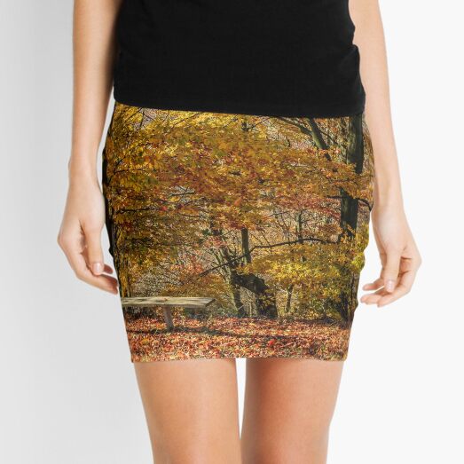 forest in red foliage on sunny autumn day Mini Skirt