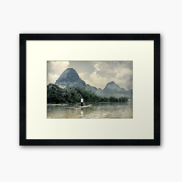 Bamboo boat Framed Art Print